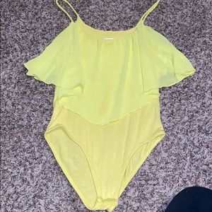 Yellow body suit